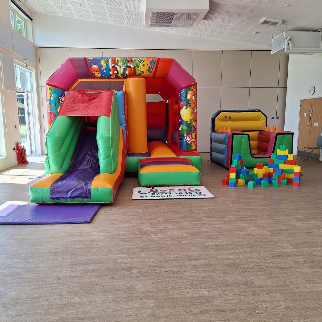 Multicoloured Bounce 'n' Slide Bouncy Castle & Inflatable Ball Pool Juggler Package