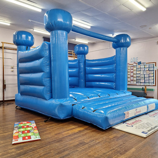 Pastel Blue Bouncy Castle & Assault Course 50ft Blue & Black Inflatable Obstacle Course
