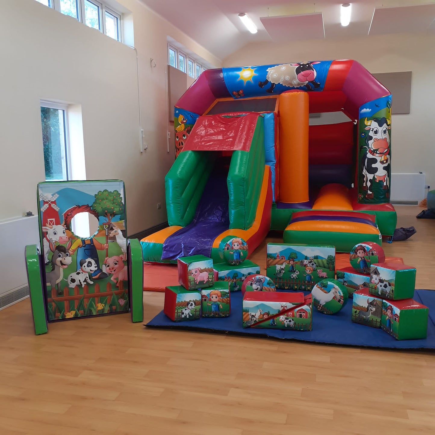 Farm Bounce 'n' Slide Bouncy Castle, Soft Play & 'face in hole' Peek a Boo Package