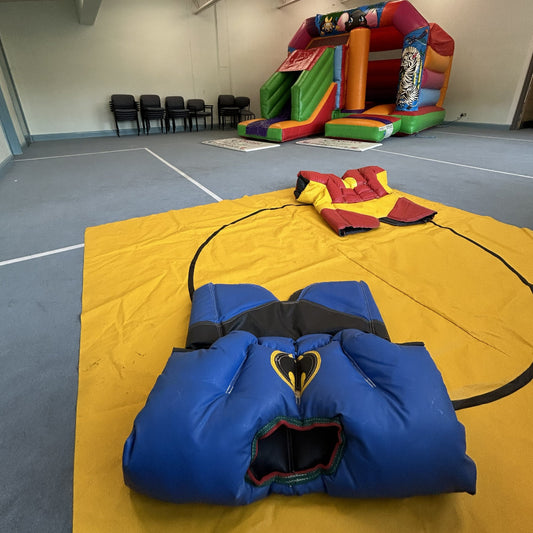 Child Superhero Sumo Wrestling Game