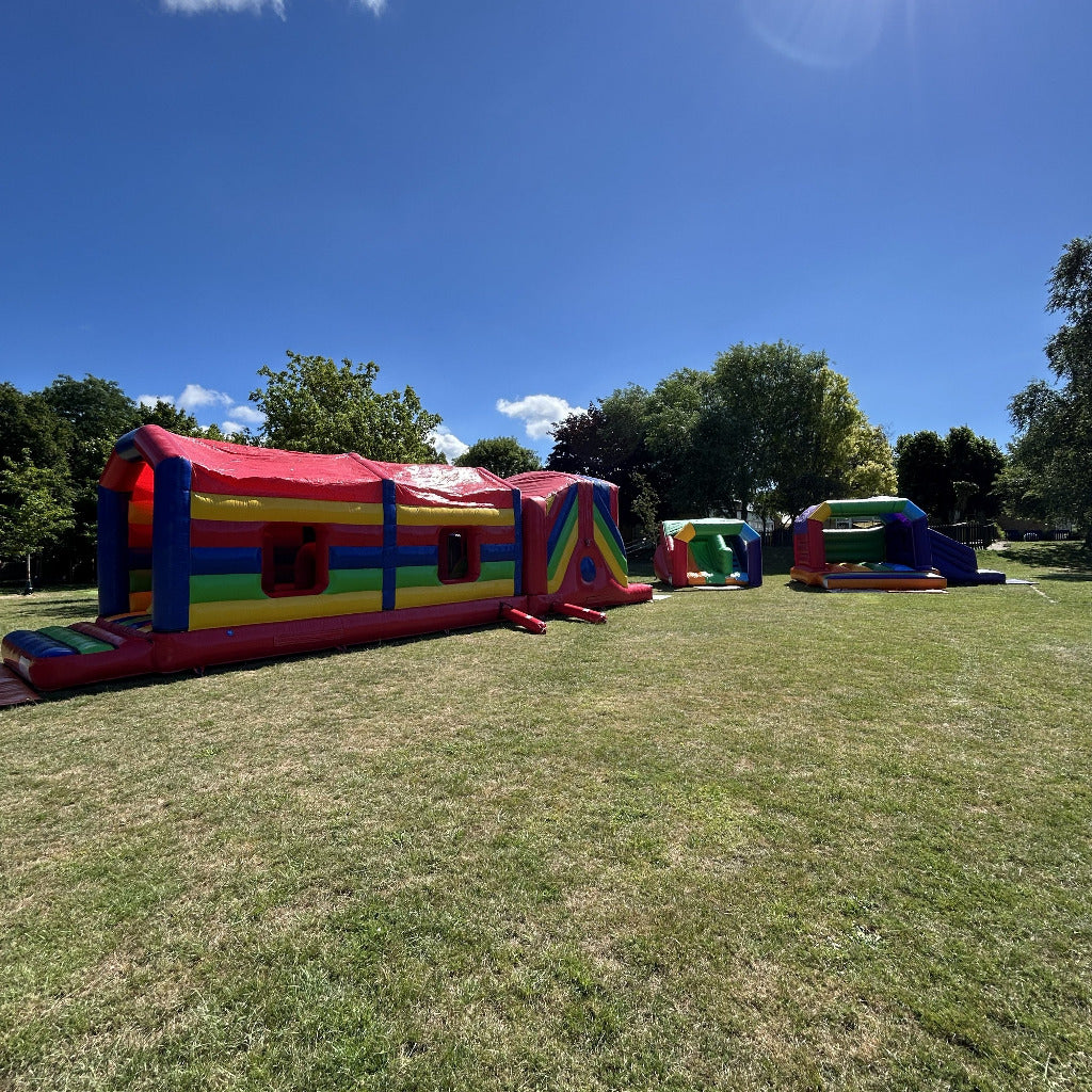Assault Course 46ft Multicoloured Inflatable Obstacle Course, Multicoloured Rainbow Junior Platform Inflatable Slide & Multicoloured Rainbow Bounce n Slide